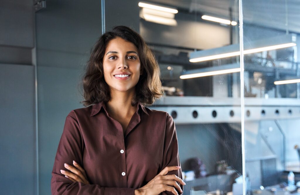 Portrait Of Beautiful Successful Hispanic, Young Business Woman With Crossed Arms